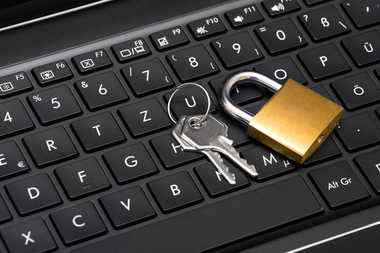 Padlock on Laptop with keys