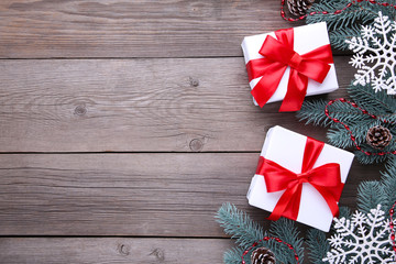 Christmas gifts presents with decorations on a grey background.