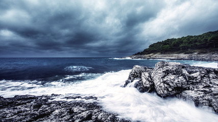 Stormy clouds and big waves on the Mali Losinj beach in Croatia