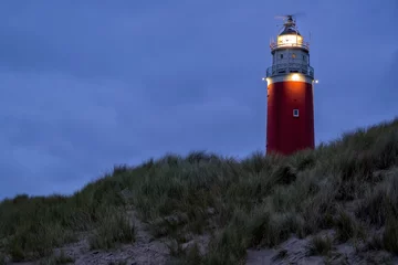 Cercles muraux Phare Eierland Lighthouse on the northernmost tip of the Dutch island of Texel after dusk