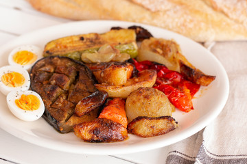 Grilled vegetables with hard boiled eggs.