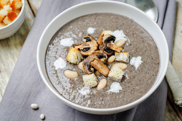 White bean mushrooms soup with croutons