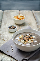 White bean mushrooms soup with croutons