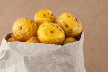 Fried yellow potato (Solanum phureja) isolated in beige background