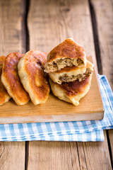 Homemade fried mushroom patties, rustic style, vintage, wooden background
