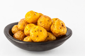 Naklejka na ściany i meble Fried yellow potato (Solanum phureja) isolated in white background