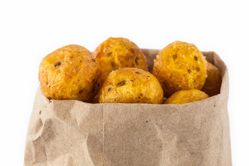 Fried yellow potato (Solanum phureja) isolated in white background