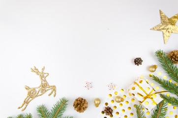 Christmas mockup flat lay styled scene with christmas tree,deer, golden star and decorations. Copy space