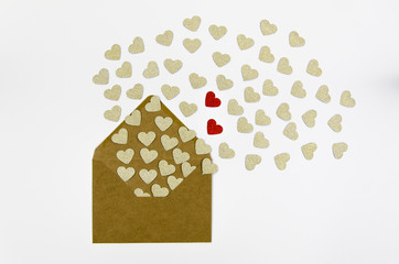 Colorful Valentine Day greeting card envelopes with heart. Golden and Red hearts pours out of the envelope isolated on white. Hearts fly out from the envelope. Love Letter.