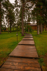 Fototapeta na wymiar Wooden path to monastery