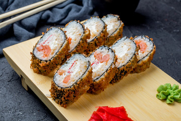 Hot roll with salmon and crab