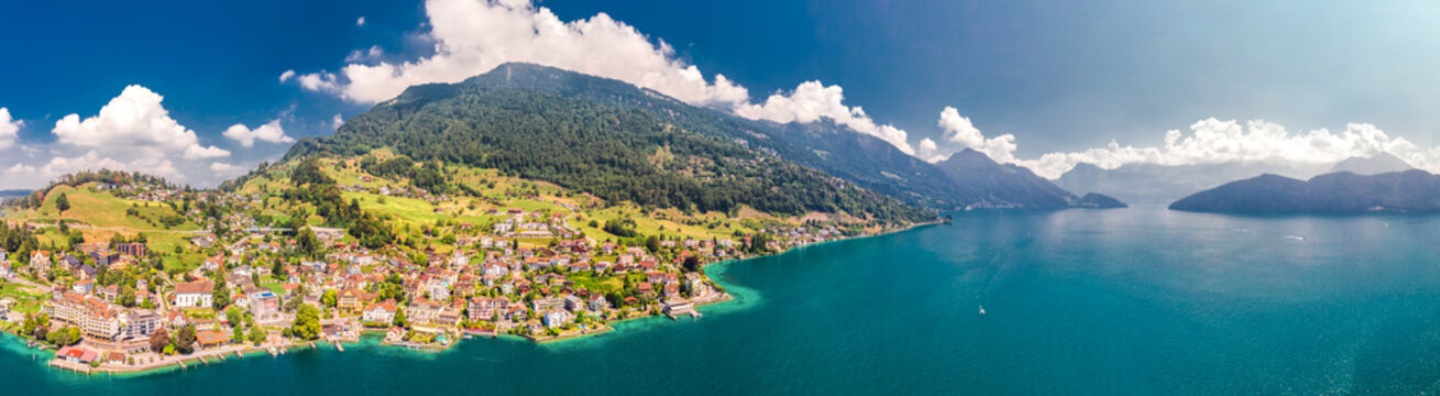 Village Weggis, lake Lucerne (Vierwaldstatersee), Rigi mountain and Swiss Alps in the background near famous Lucerne city, Switzerland