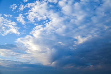 Naklejka na ściany i meble Dark clouds in blue stormy sky, natural photo