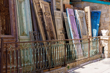A lot of antique doors for sale. Street shop of Antiques