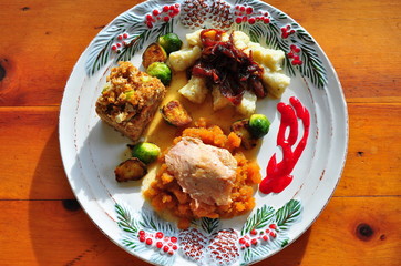 Turkey Oyster on a bed of rutabaga mash, rosemary potato gnocchi topped with caramelized onions,...