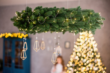 Beautiful Christmas chandelier of Christmas tree branches