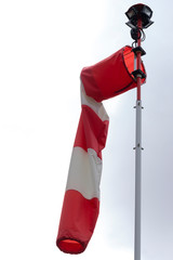 windsock with gray sky