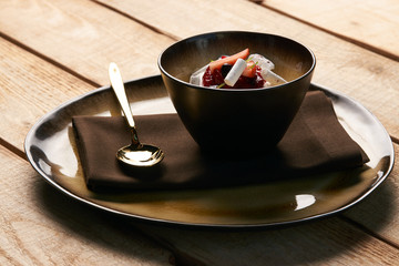 Estonian sweet dessert Kama with yoghurt mousse, wild berries an