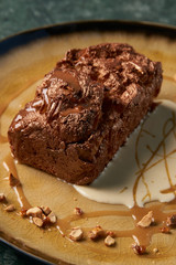 Plate with dessert , chocolate fondant lava cake with custard