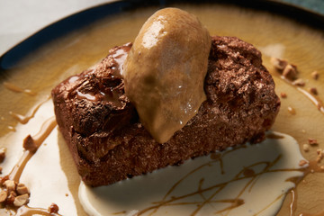 Plate with dessert , chocolate fondant lava cake with custard