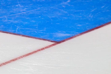 Red goal line on ice hockey rink. Winter sport