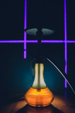 Hookah hot coals on shisha bowl with black background. Stylish oriental shisha. Shisha Concept.