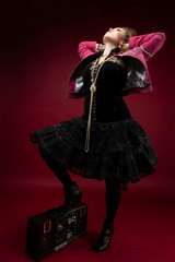 Girl 1980's style, with boom box