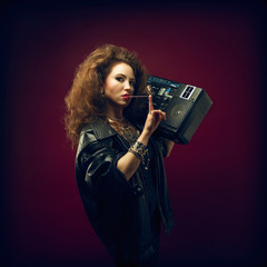 Girl with boom box and bubble gum, 1980's style