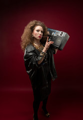 Girl with boom box and bubble gum, 1980's style