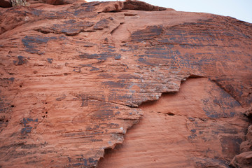 Ancient petroglyphs by native american peoples as seen along Mouses Tank trail in the Valley of Fire State Park in Nevada
