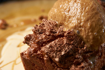 Delicious chocolate fondant lava cake with custard and pistachio