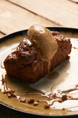 Delicious chocolate fondant lava cake with custard and pistachio