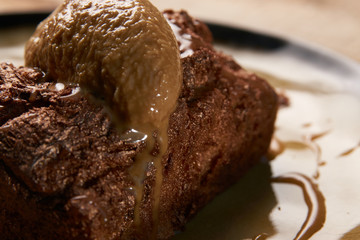 Delicious chocolate fondant lava cake with custard and pistachio
