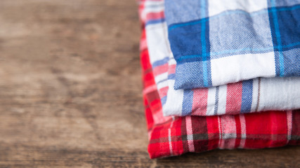 shirts plaid on wooden background