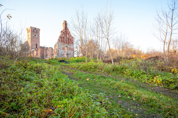 abandoned ruins of an old red brick medieval church