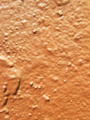 Background painted in orange on a wall