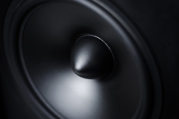 membrane sound speaker on black background, close up