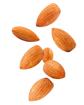 7456485 Falling almond isolated on white background, clipping path, full depth of field