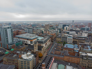 Obraz premium Leeds town centre aerial photo taken on a partly cloudy day.