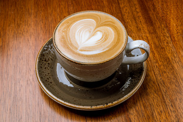 Cappuccino coffee with heart drawing