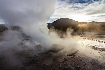 El Tatio Geysers at Atacama desert, amazing thermal waters at 4500 masl inside the Andes a place with an awe geothermal activity below the ground. Volcanic activity at Atacama , Chile