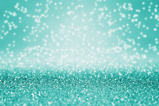Teal and turquoise glitter background for happy birthday, Christmas or diamond jewelry sparkle