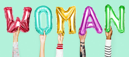 Hands showing woman balloons word