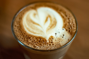 Closeup of latte art on top of the flatwhite coffee