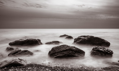 Long exposure: rocks and stones on the seashore