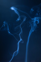 Abstract blue smoke swirls
