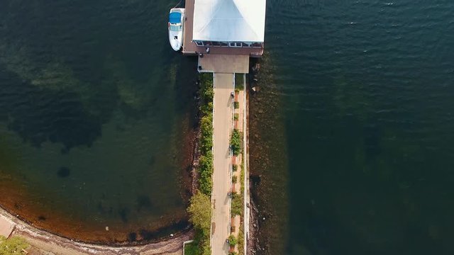 top aerial view building on the pier, blue sea and wedding ceremonies