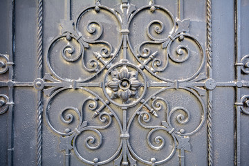 Element of architectural decor lattice, exterior. Metal wrought iron gate