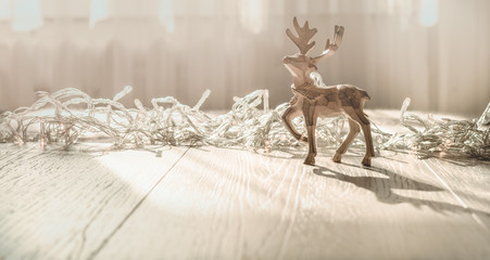 Merry Christmas Card with christmas deerchristmas decorations over grunge background