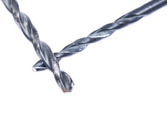 Old used drill bits isolated on white background